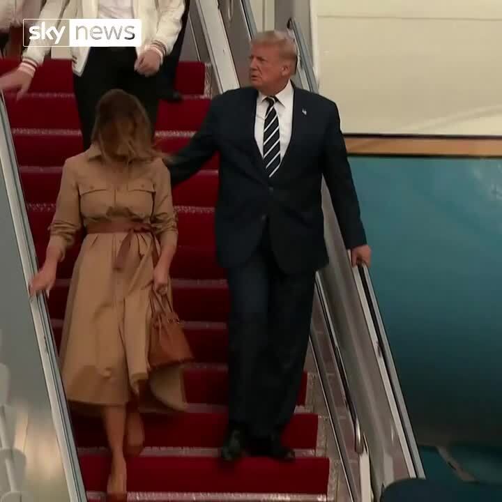 Melania Trump pulls her hand away from Donald Trump's as they step off Air Force One | US News | Sky News