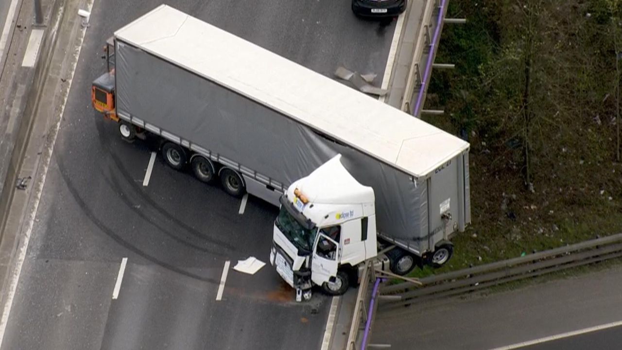 Jack knifed lorry inches from falling off bridge