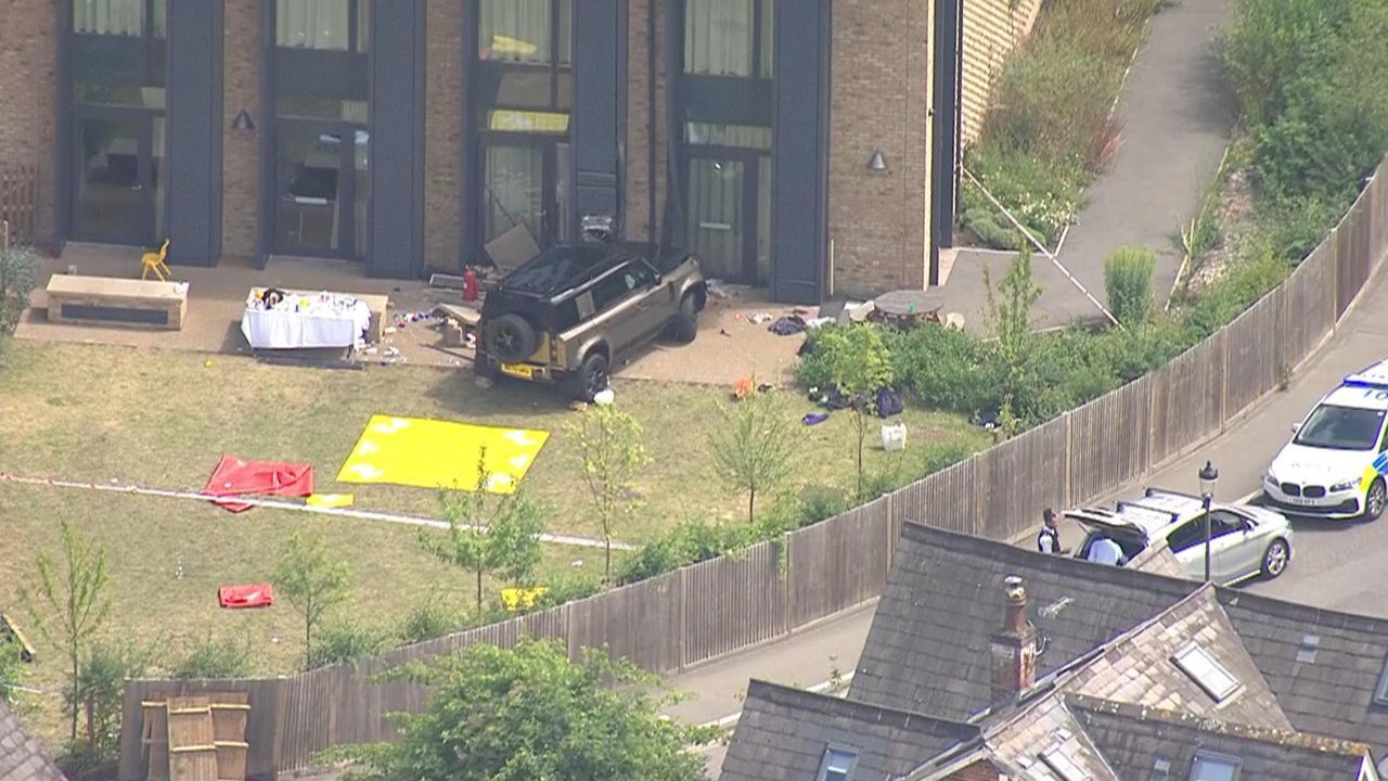 A girl has died after a Land Rover crashed into a primary school in southwest London