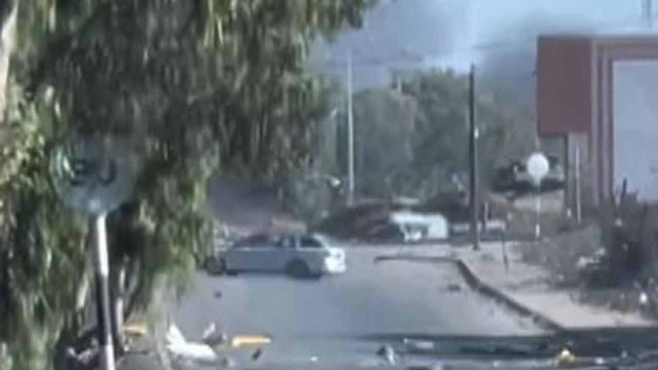 Moment tank fires at car in Gaza