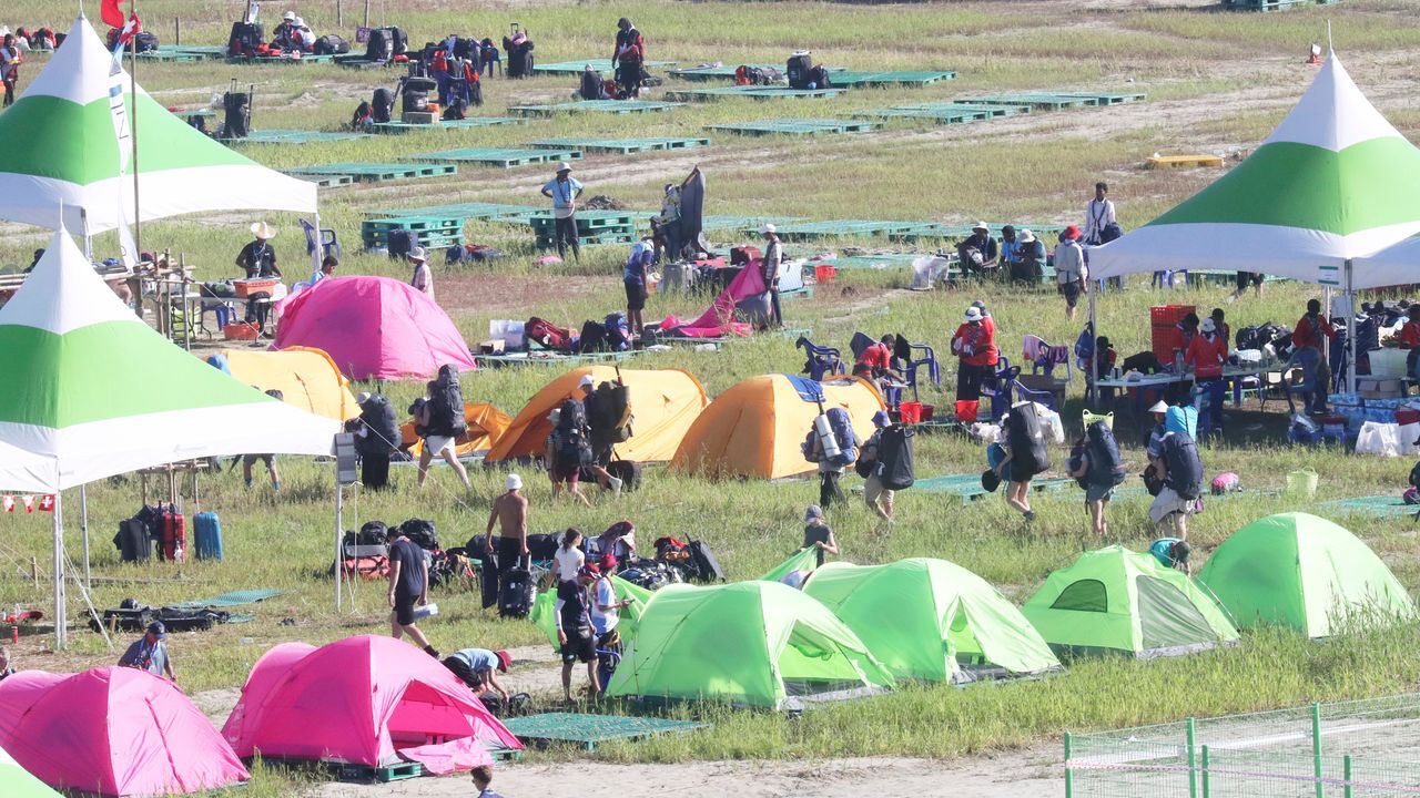 Thousands of scouts are evacuated from World Jamboree site as typhoon  approaches.